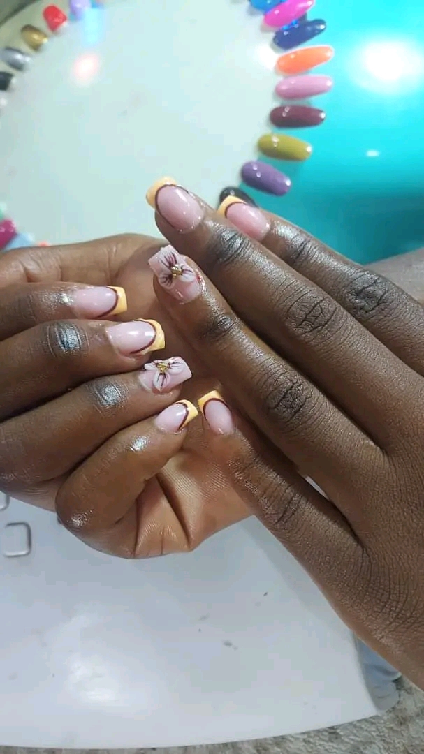 Mbewe's nails